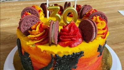 Godzilla Birthday Cake; red velvet with vanilla buttercream and red velvet oreos - 8”