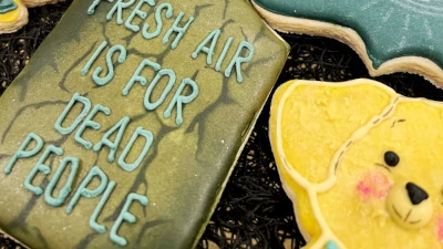 Cookies for a podcast 'Morbid' with their quote 'Fresh air is for dead people', yellow lab